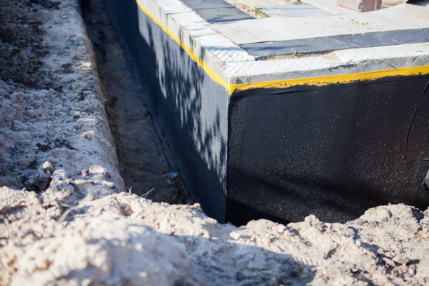 Professional Waterproofing technician working in Winfield, TN